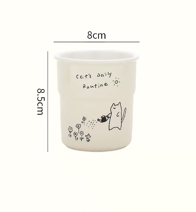 Handcrafted pottery cup with sweet kitten watering plants illustration on a cream glaze background. Ideal for aesthetic interiors, a unique coffee mug for tea lovers and gardeners.