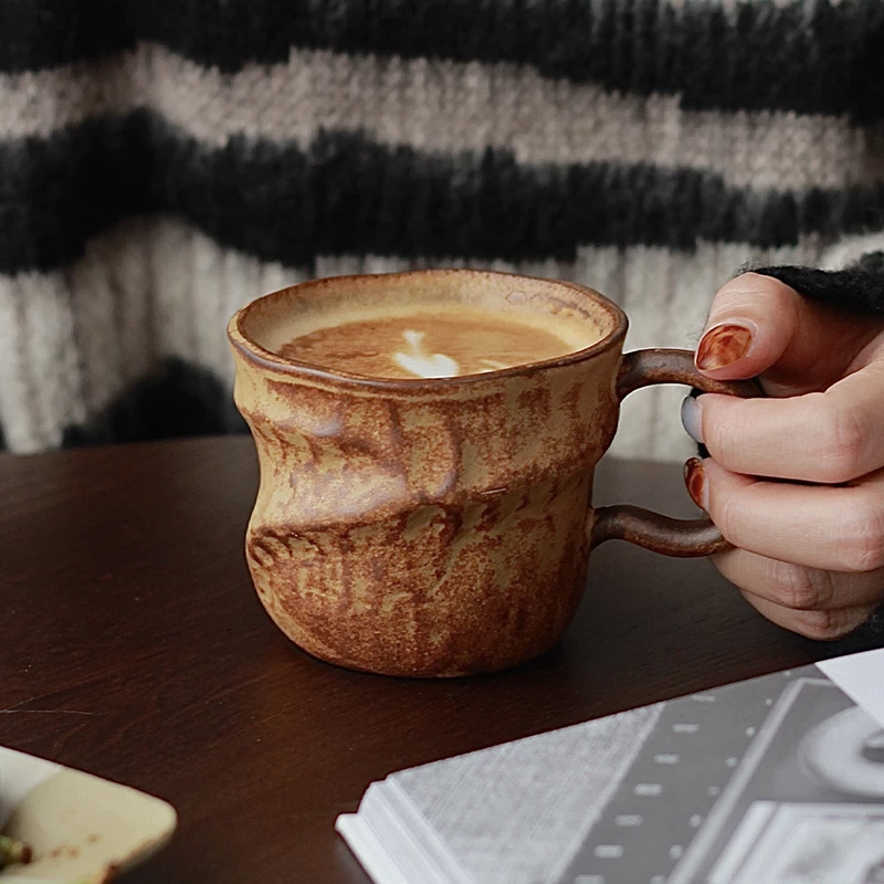 Textured stoneware mug with volcanic glaze, ideal for coffee, tea, and daily rituals.