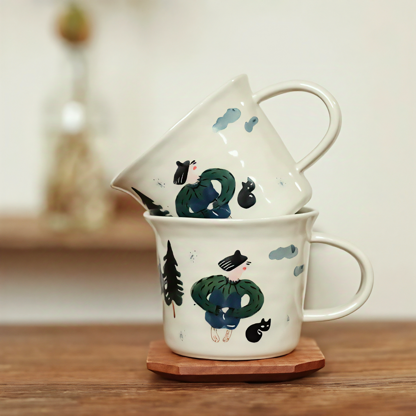 Artistic pottery mug with smooth glazed surface, showcasing minimalist woodland illustrations in calming beige and grey tones. Ideal for lovers of artistic coffee cups, aesthetic ceramic drinkware, and fairy-tale forest gifts.