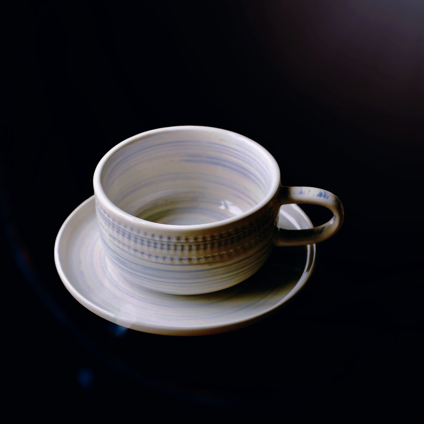 Premium ceramic drinkware with brush glaze detail, designed for slow-living rituals.