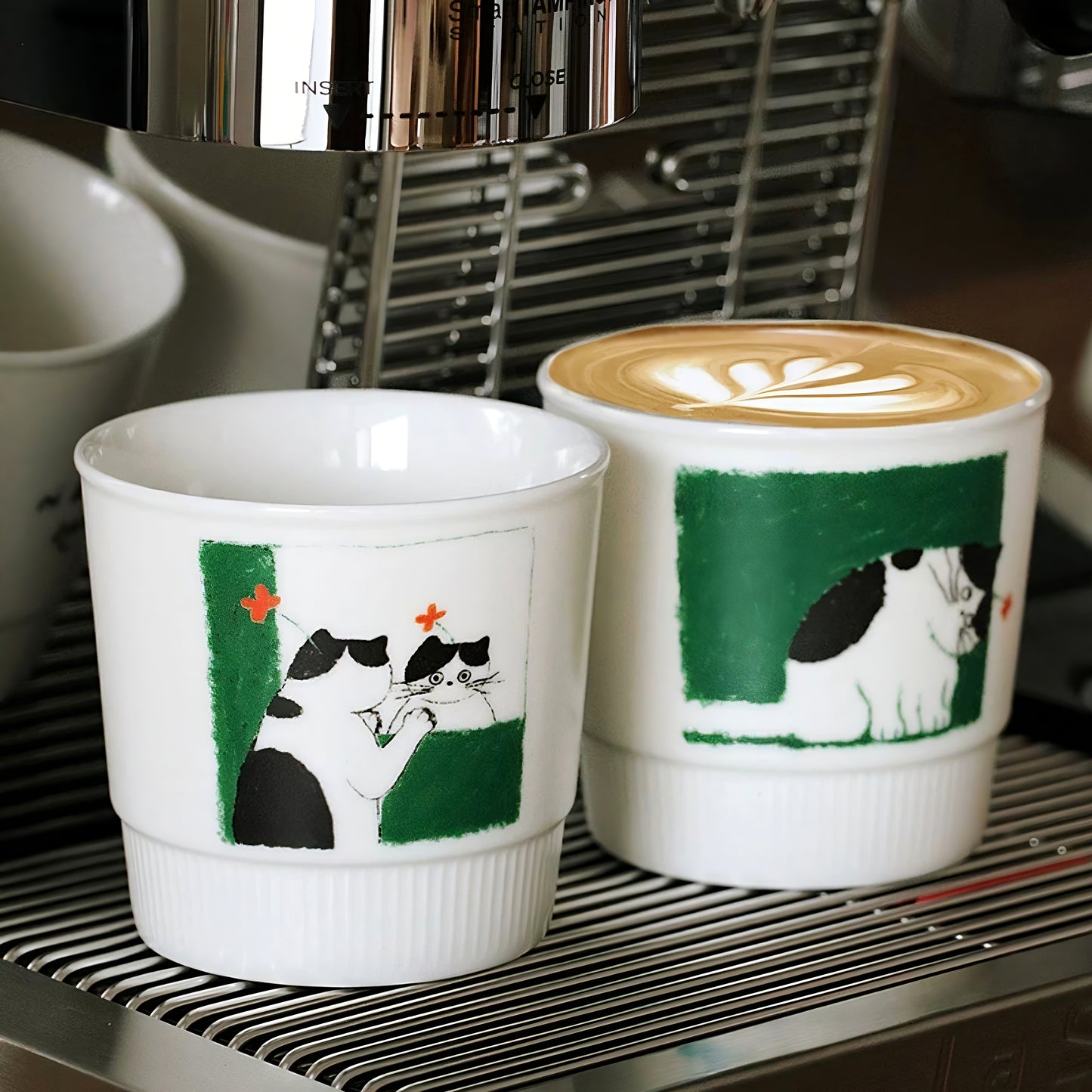 Cute hand-painted mugs showing a contemplative kitten under a soft green sky. A delightful gift for coffee lovers and ideal as a cozy home essential or part of a Zakka-inspired kitchen.