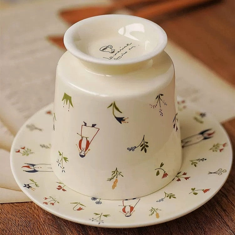 Handcrafted ceramic tea cup and saucer with secret garden and cute snowman design. Unqiue and stylish for daily use or home decoration.