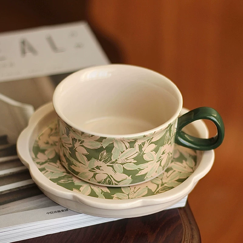 Premium ceramic coffee cup and saucer set with floral motif, oven- and microwave-safe. Perfect gift for girls, mother, coffee lovers.