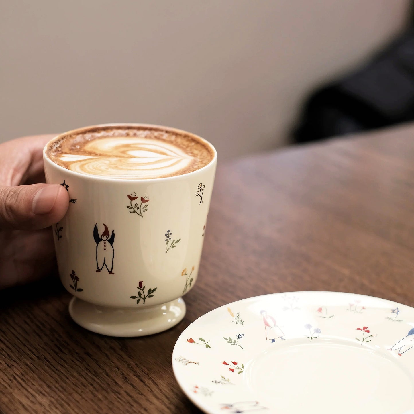 Cute and unique gift idea ceramic set with whimsical snowman artwork and floral patterns.