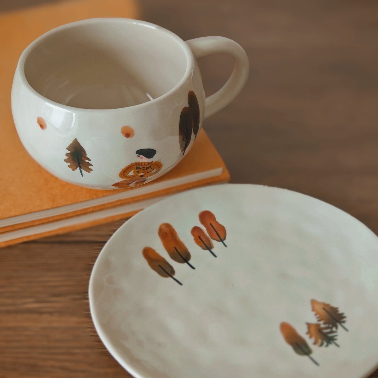 Adorable ceramic tea cup and saucer set with a playful botanical illustration and forest girl drawing. The cup’s 280ml (9.47 oz) capacity makes it ideal for coffee or tea. A heartwarming coffee mug that combines functional drinkware with artistic storytelling.