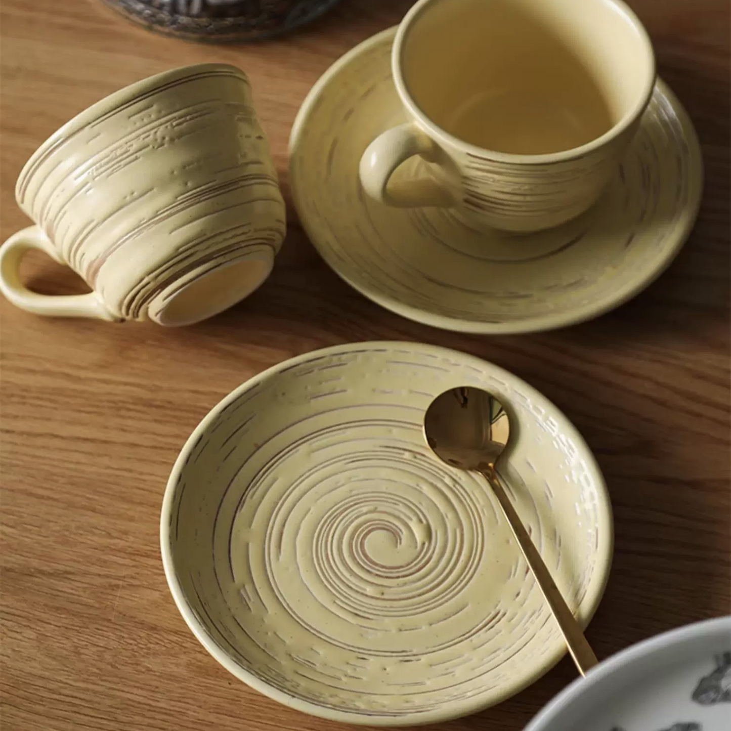 Minimalist, earthy-toned coffee cup with unique textured design. This artistic mug is perfect for cozy moments and thoughtful gifts. Microwave and dishwasher safe.
