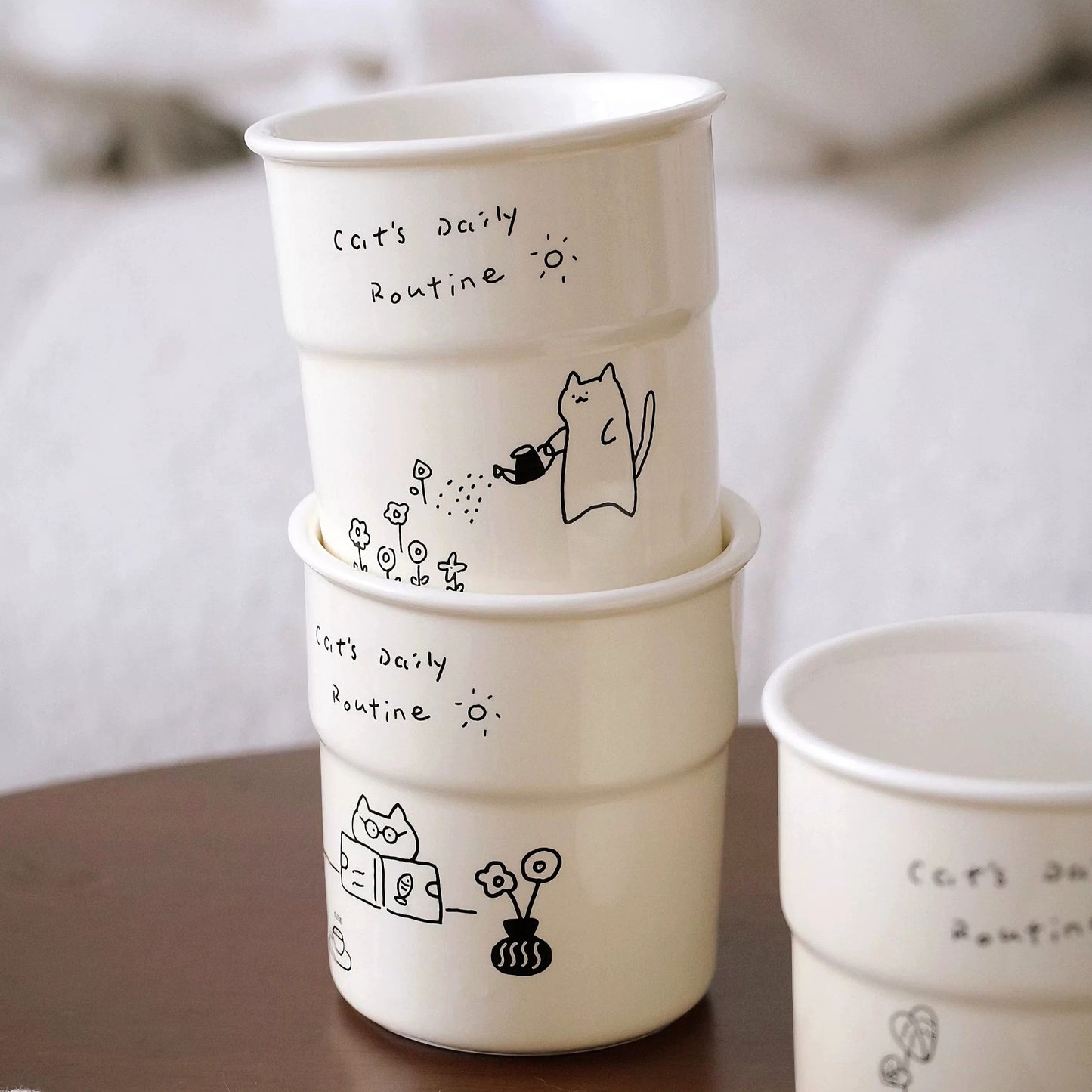 Microwave-safe latte mug with artistic pottery style and cheerful kitten art, a delightful doodle mug perfect for relaxing tea time or weekend brunch.