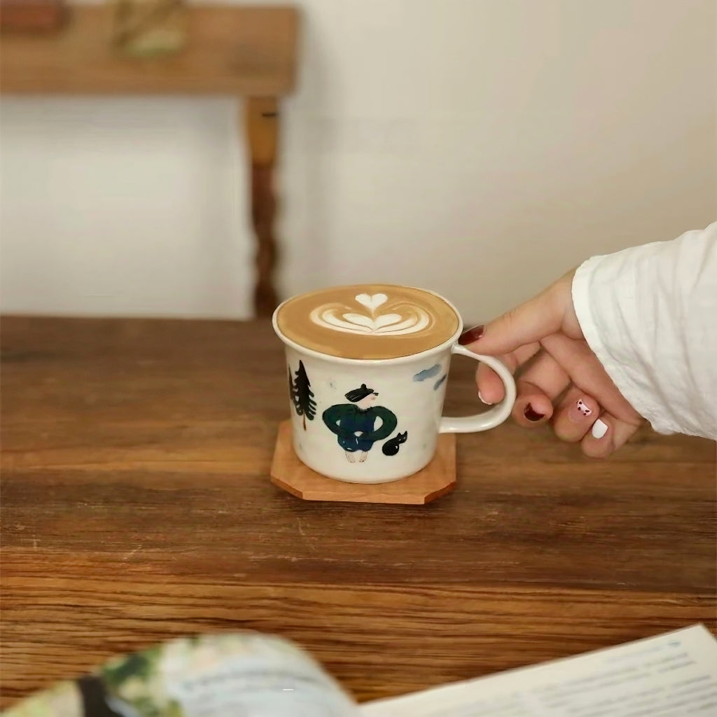 Cute hand-drawn ceramic mug perfect for playful kids-style home decor. The adorable illustrated forest scene and charming characters bring joy to any drinkware set, ideal for those who enjoy sweet and whimsical cups.