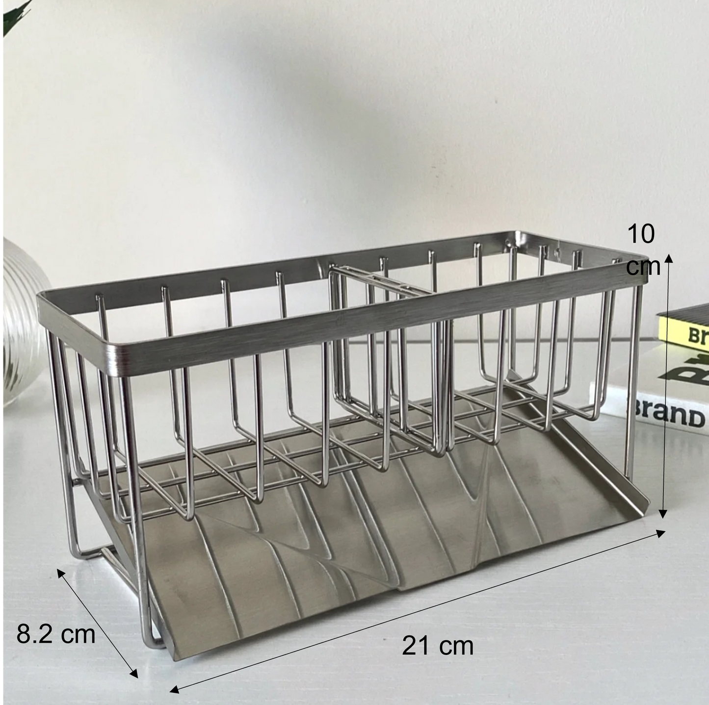 Efficient kitchen sink organizer, stainless steel rack with removable drip tray for easy cleaning.