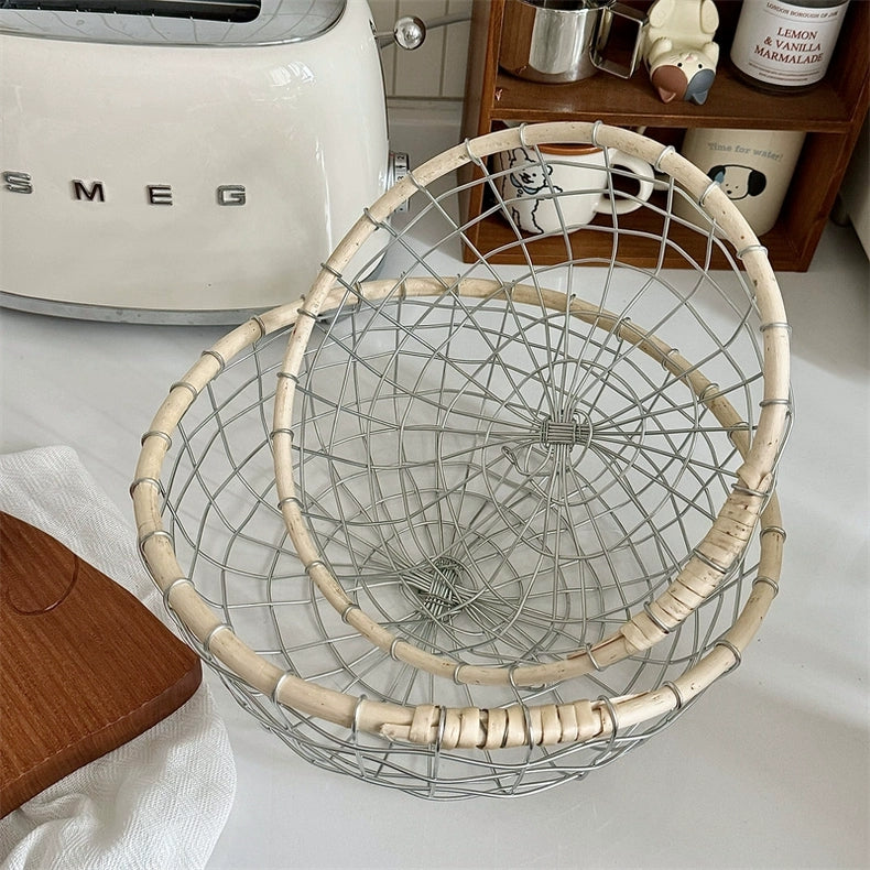 Full view of the round woven metal wire storage basket, emphasizing its decorative design and generous dimensions for stylish and practical home storage. Two sizes available.