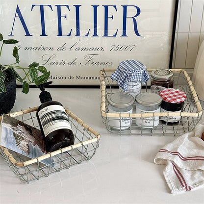 Decorative square woven metal wire basket with jam jars, showcasing its spacious design and natural-inspired aesthetics for warm minimalism decor.