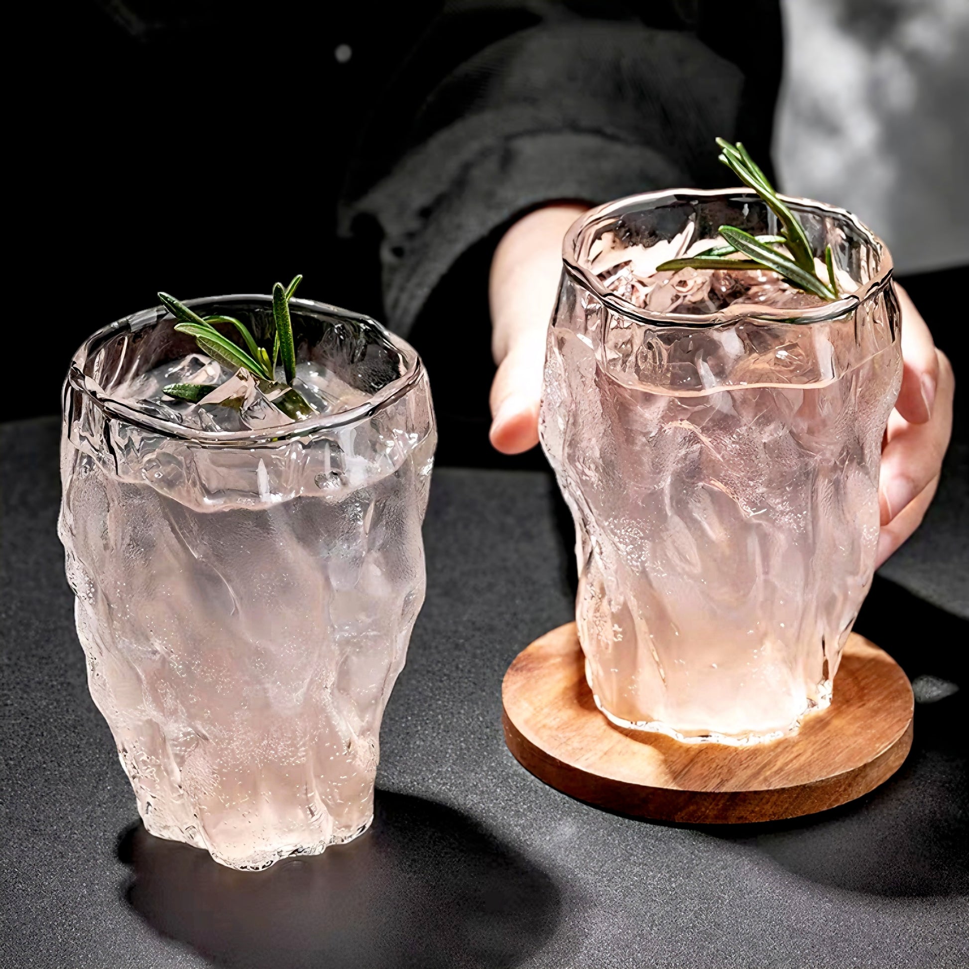 Durable, heat-resistant glass cup featuring a twisted design, filled with a cocktail for an elegant presentation.