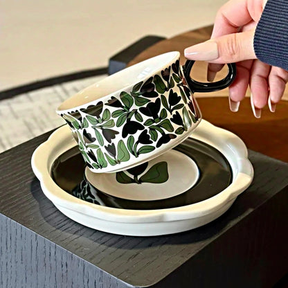Aesthetic tea cup with botanical forest pattern, hand-glazed ceramic design, ideal for rustic and modern kitchens.