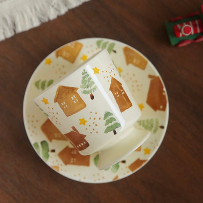 Cute footed cup with illustrated houses and pine trees, ideal for cozy Nordic-inspired homes. Durable and high-quality ceramic.