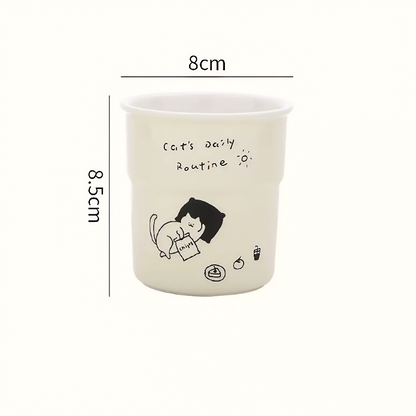 Artistic coffee cup featuring a kitten napping peacefully. Made from high-quality stoneware, it fits any soft Nordic home and serves as a charming decorative drinkware piece.