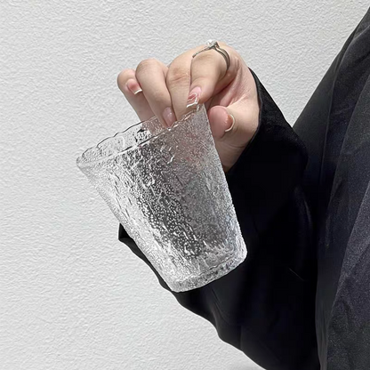 250ML clear gradient glacier glass cup with textured design. Versatile drinkware for whiskey, tea, and juice in modern home settings.