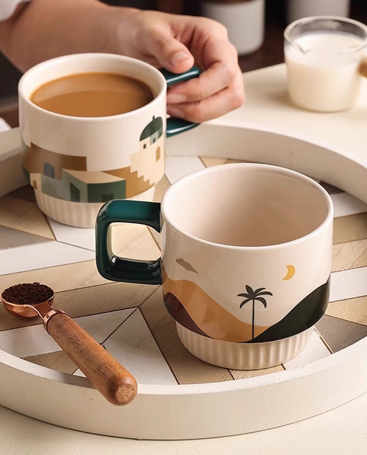 Aesthetic ceramic mug showcasing a serene desert pattern, holding freshly brewed coffee in its premium, high-quality design.