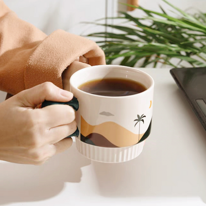 Durable and elegant ceramic mug, printed with an oasis design, holding freshly brewed coffee, combining aesthetics and practicality.