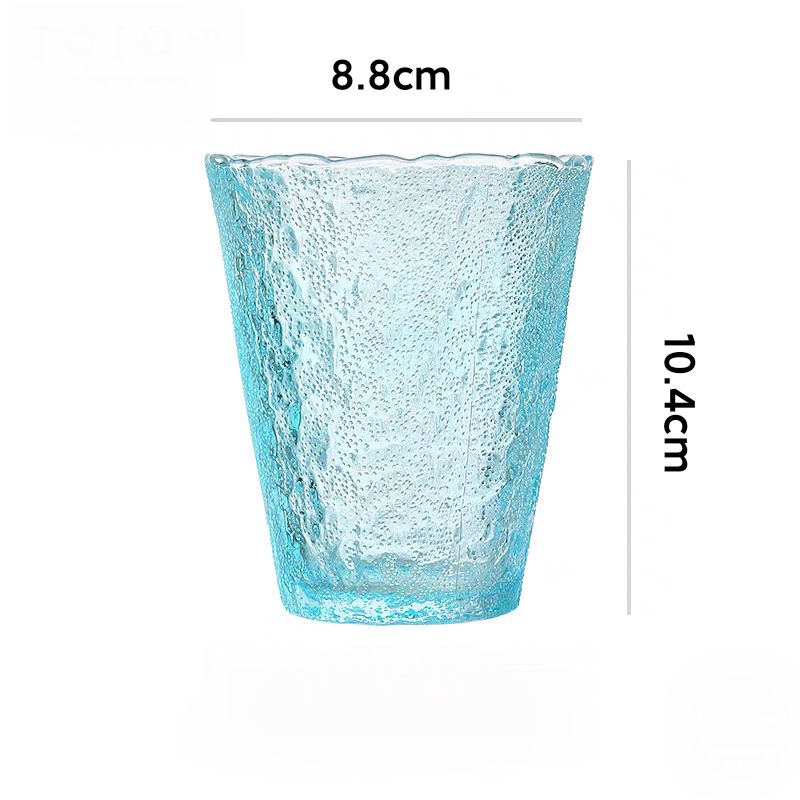 Blue gradient glass with glacier-inspired patterns. Durable and elegant cup for hot and cold drinks, perfect for minimalist interiors.