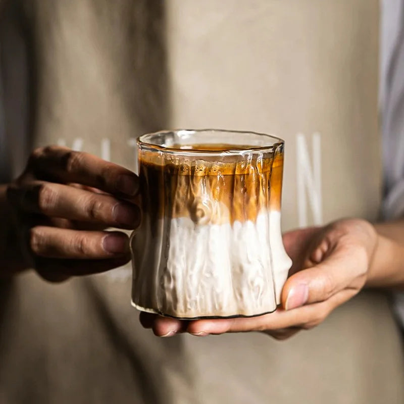 Dirty coffee in a 300ML Rippled Glass Cup, crafted from durable glass with an artisan wavy design, microwave and dishwasher safe.