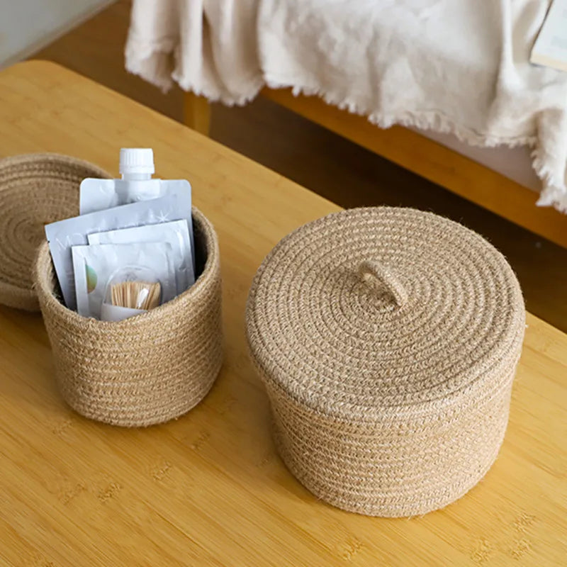 Featuring a round shape and woven texture, perfect for organizing skincare and cosmetic products on a vanity or countertop.