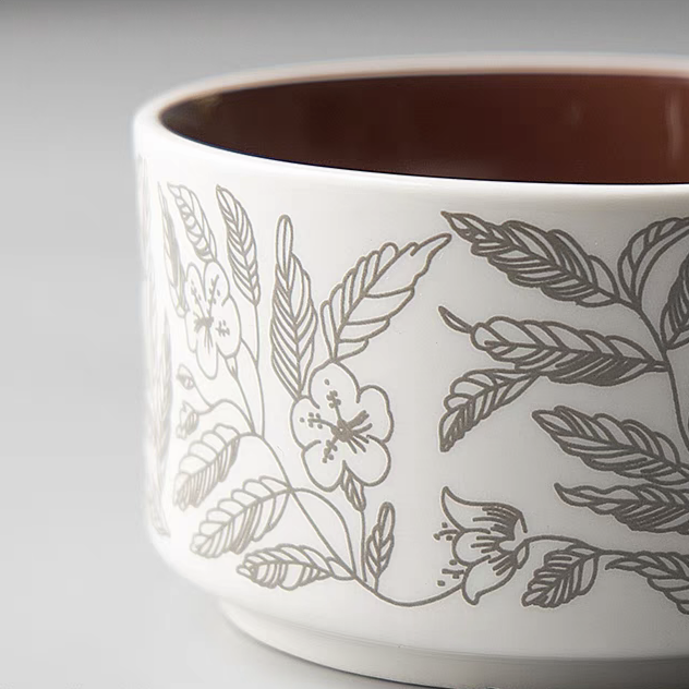 An elegant  ceramic cup with dedicated floral patterns , great for minimalist and eco-conscious tableware collections.