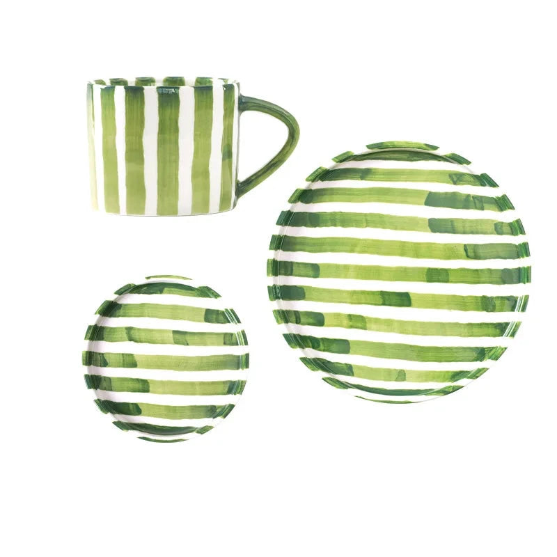 Complete set of a modern ceramic cup with two matching plates, featuring hand-painted green grass stripes and a minimalist Nordic design, ideal for hot beverages and desserts.