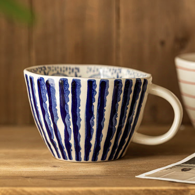 Elegant Nordic style mug with a blue pattern, perfect for coffee, tea and more.