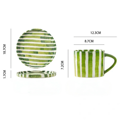 Large ceramic plate and cup set with elegant green grass stripes, designed in a modern Scandinavian style, perfect for main courses and desserts.