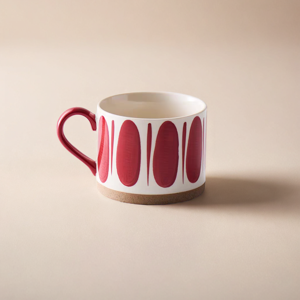 Red-patterned ceramic mug with a Scandinavian-inspired minimalist design, perfect for coffee or tea.