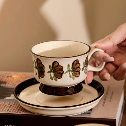 A 220ml (7.44 oz) ceramic cup with artisan painted grape motifs, blending Scandinavian and minimalist styles.