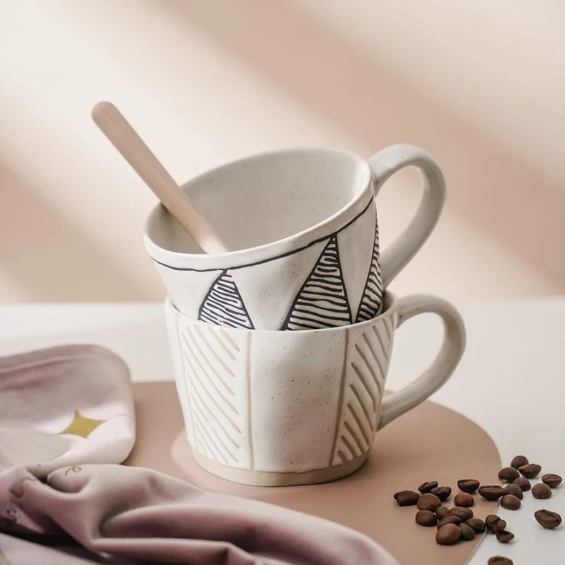 Detailed view of the abstract minimalist pattern on a handcrafted ceramic cup, highlighting Japandi craftsmanship and elegance.