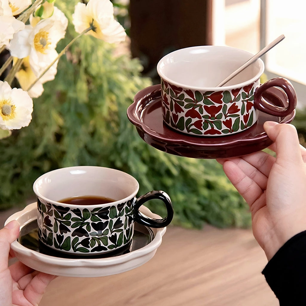 Handmade ceramic cup with bold botanical design, stylish for tea tables and neutral home décor. ideal for gift or home use.