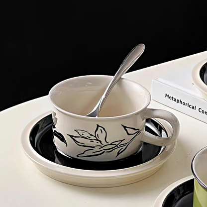 A minimalist floral ceramic cup designed for hot beverages, featuring a durable and heat-resistant construction.