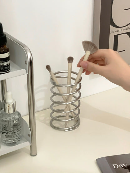 Stainless steel brush holder for multi-purpose use, great for organizing makeup brushes, toothbrushes, and even pens on your desk.