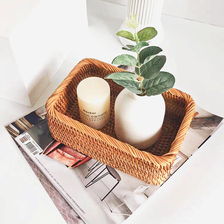 Rattan wicker storage box used for organizing incense, providing a stylish countertop storage solution