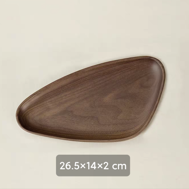 Close-up of the triangle-shaped solid wood serving tray, showcasing the natural walnut wood finish and durable craftsmanship, ideal for use as a decorative snack tray.