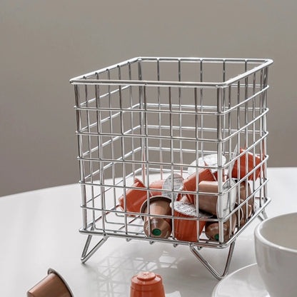 Small countertop storage basket crafted from durable and rust-resistant metal wire, ensuring long-lasting use and reliability.