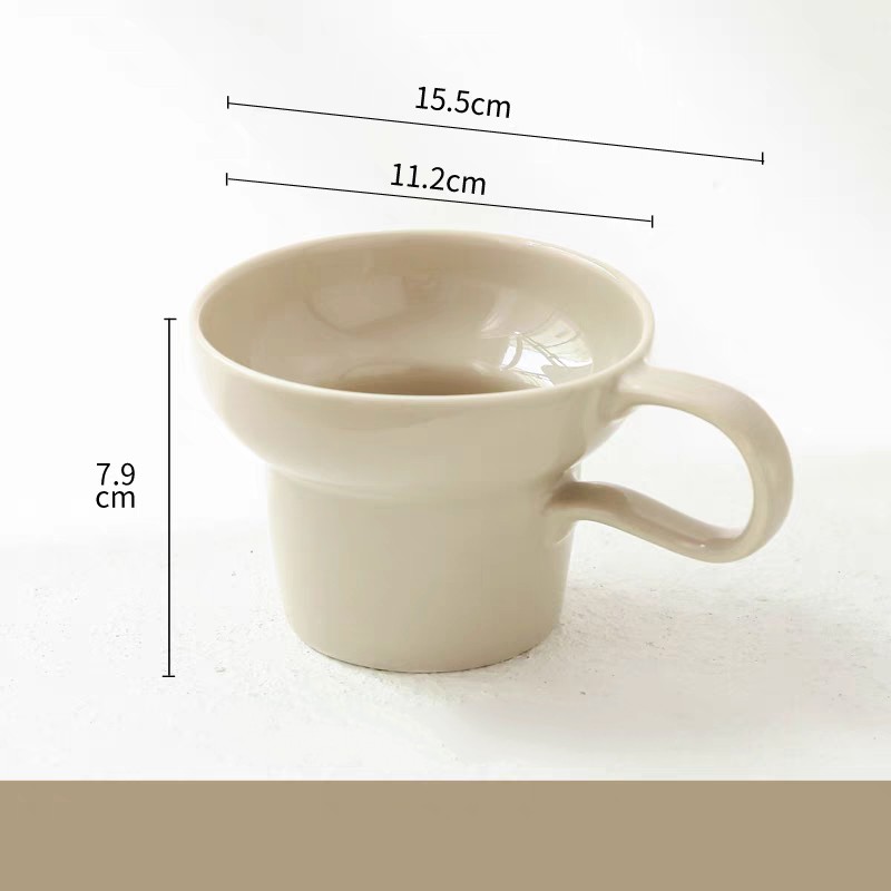 Versatile Premium Minimalist Retro Ceramic Cup in creamy beige - Highlighting its elegent colour and stylish retro design, perfect for modern and Scandinavian-inspired decor.