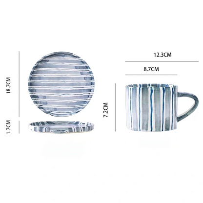 A Cup and a large ceramic plate with elegant cerulean blue stripes, designed with a minimalist and contemporary Nordic style. Perfect for main courses, this plate adds a stylish touch to your modern dining experience.