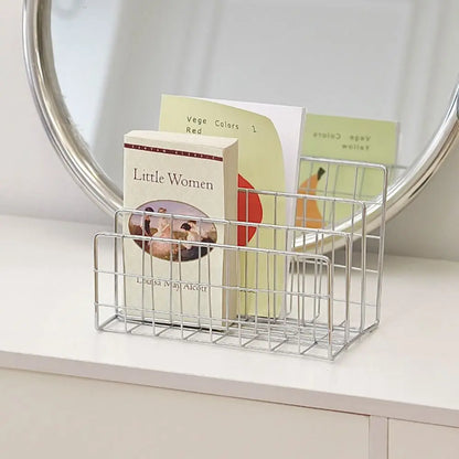 Featuring three tiers, perfect for storing and displaying books and notebooks in a contemporary bedroom setting.