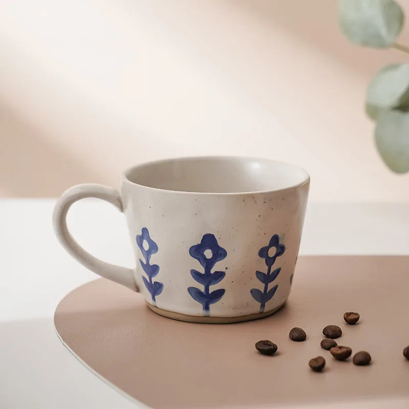A handcrafted, minimalist ceramic mug with a Scandinavia-inspired design, ideal for sipping tea or coffee in serene style.