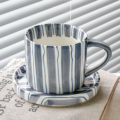 Versatile ceramic cup and plate set in cerulean blue, perfect for coffee, tea, and desserts, blending style and practicality for daily use.