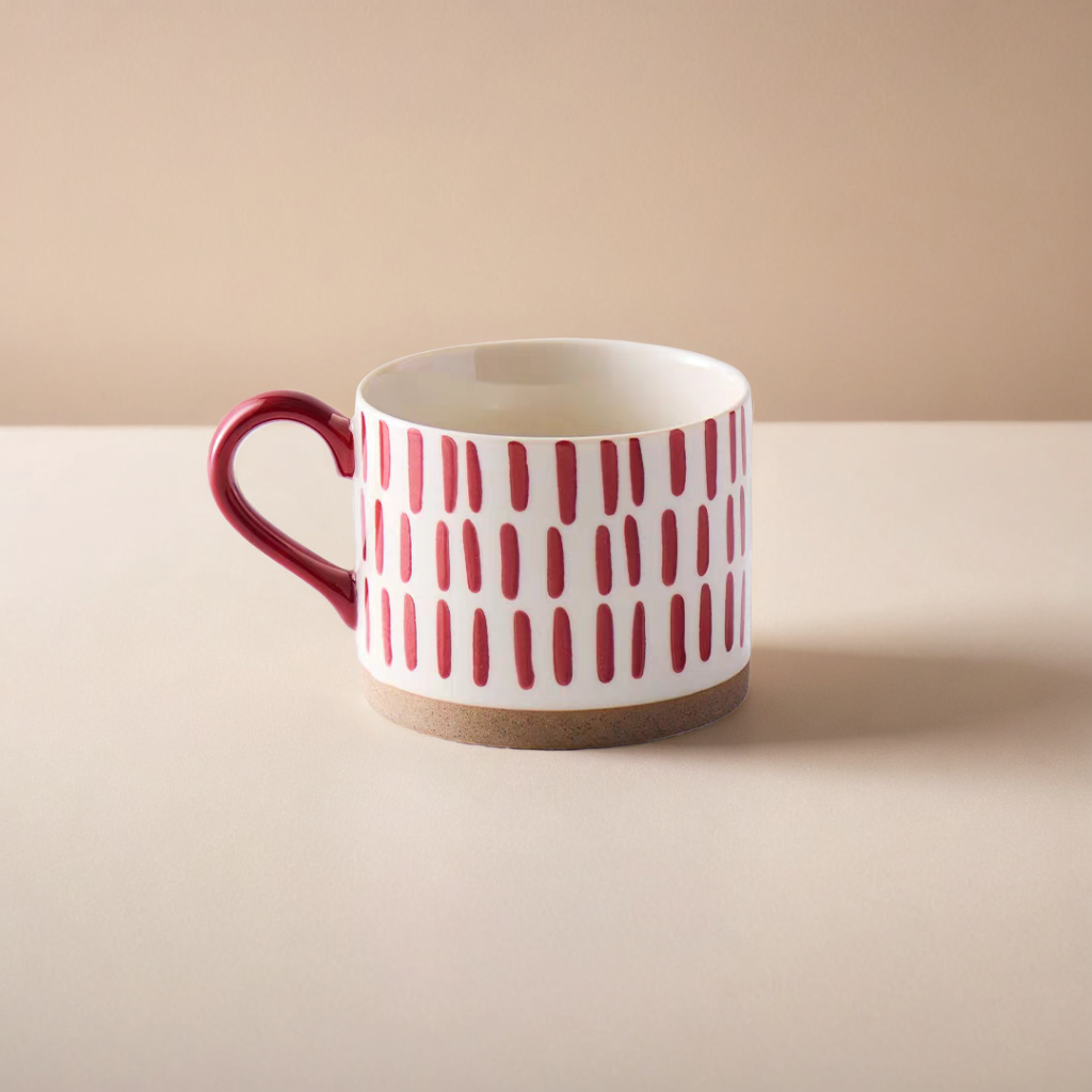 Nordic-style ceramic mug with a cozy red pattern and smooth glaze, perfect for morning coffee rituals.