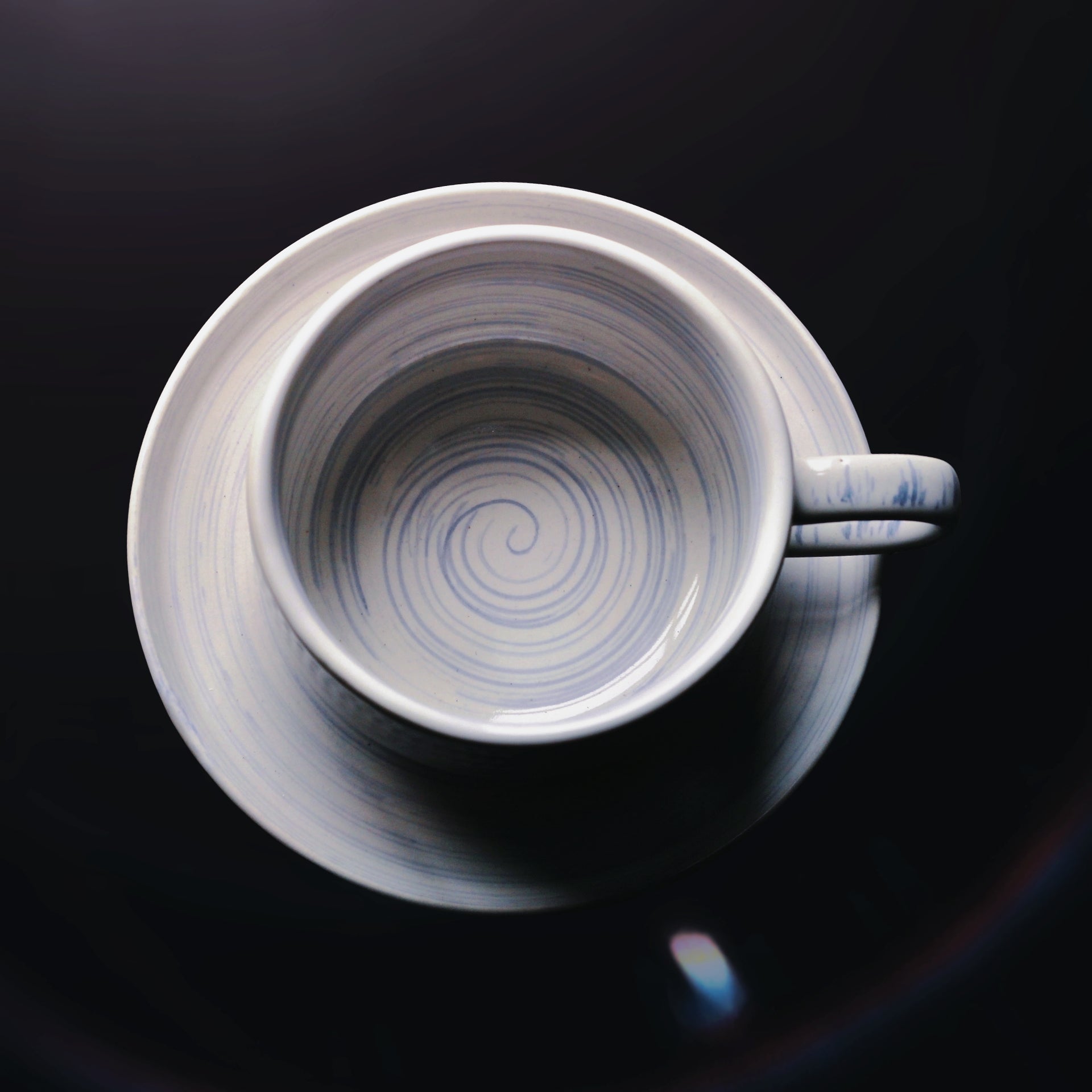Scandinavian-inspired ceramic cup with Wabi-Sabi imperfections and calming earthy tones.