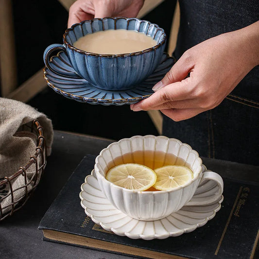 legant tea cup set suitable for both hot and iced beverages, featuring a daisy petal design.