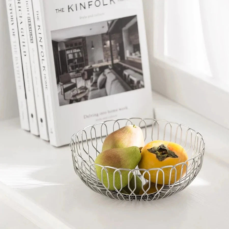 Stainless steel basket filled with colorful fruits, enhancing the sleek and contemporary look of your kitchen.