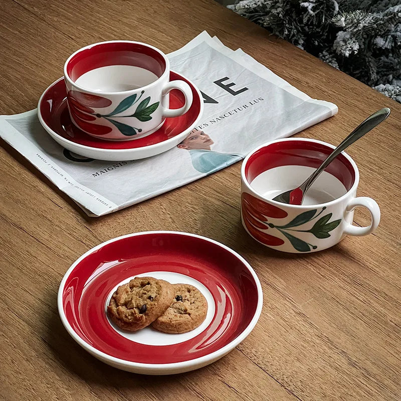 A Scandinavian-style mug with bright red floral designs, ideal for coffee, tea, afternoon tea or gifting.