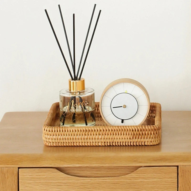 Rattan wicker tray placed in the entryway to hold keys and small items, providing practical storage