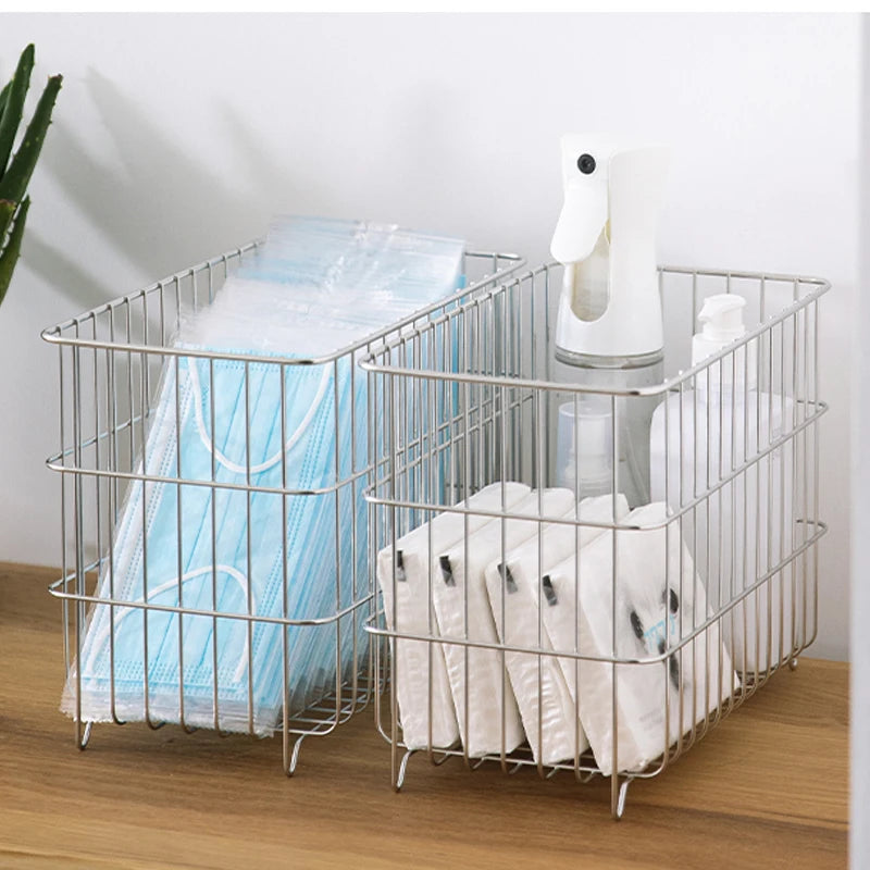 Enhance your living room decor with this stylish stainless steel basket, offering ample space to tidy up and organize various items while complementing your modern or mid-century modern interior design.